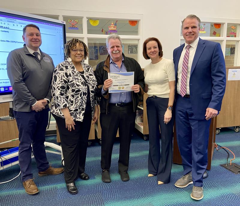 Rehoboth Elementary substitute Jeffrey Bernstein also received kudos from the board. Gathered are (l-r) Rehoboth Elementary Assistant Principal Kevin Monaghan, Principal Doris Person, Bernstein, school board President Alison Myers and Superintendent Bob Fulton.